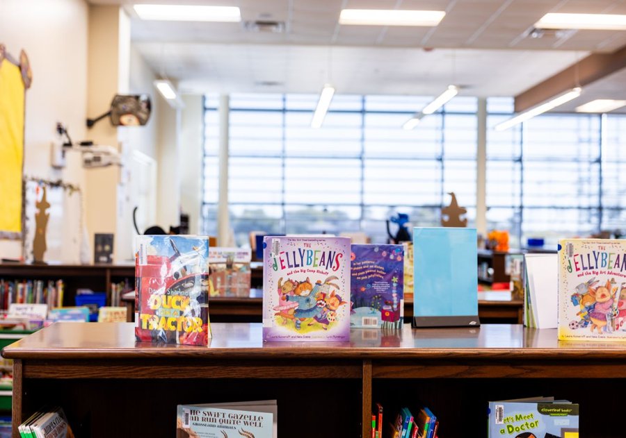 A shelf of children's books in a school library